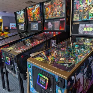 a row of pinball machines