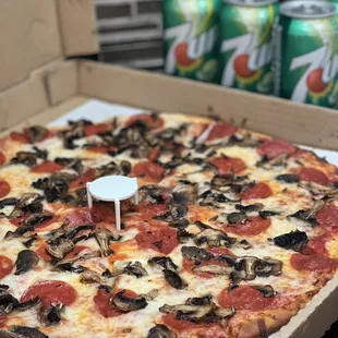 Family Meal Deal Pizza: includes wings and can sodas.