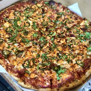 Interesting take on Banh Bahn Mi Pizza - spicy!