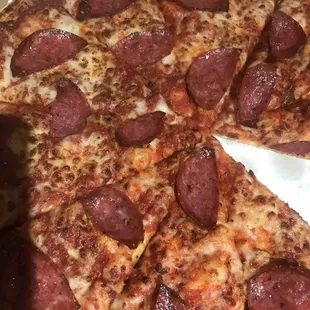 Bread w/ sauce; this is not pizza