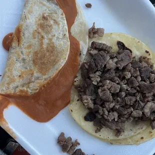 Carne taco, and a bean taco. Beans had no flavor to me, and were a strange orange red color. Steak had a lot of fatty pieces for my liking.