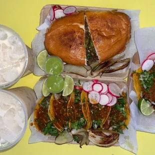 a plate of tacos and beer