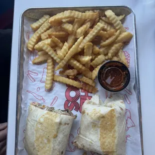 Al pastor Torta combo with Jamaica drink and grilled carne asada burrito with fries.