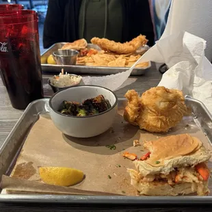 Fish n Chips and Connecticut Lobster roll with roasted Brussel sprouts .