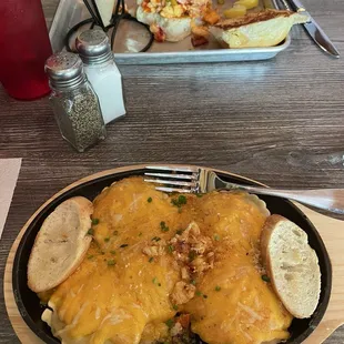 Baked Lobster Ravioli. Tasted great but they are not boiling the ravioli before baking them so the pasta is very gluey and chewy.