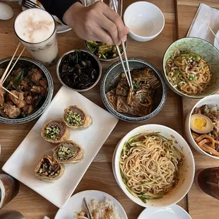 Popcorn chicken, wood ear mushrooms, pork ears, Dan Dan noodles, mapo tofu, beef roll, and minced pork.