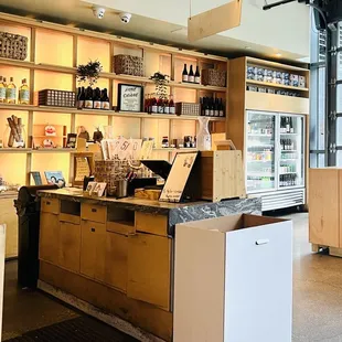 Order counter, inside. Fridge w/ additional drink options available