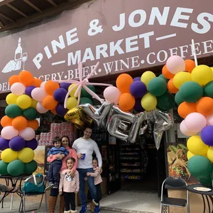 people standing in front of a store