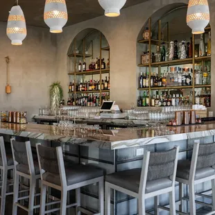 a bar with a marble counter top