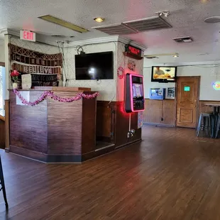Dj stage and electronic jukebox.