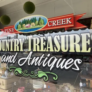 Left side front window.