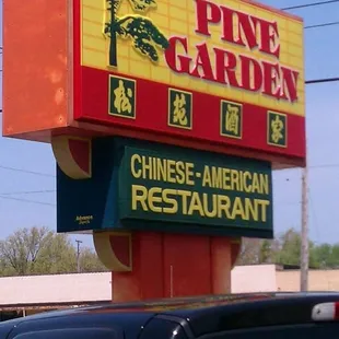 a sign for pine garden chinese american restaurant