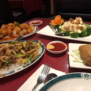 Mongolian beef, sweet and sour pork, walnut shrimp, and beef curry roll.