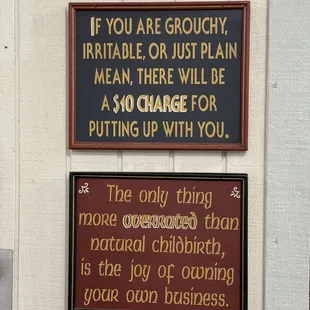 Signs Behind Cash Register