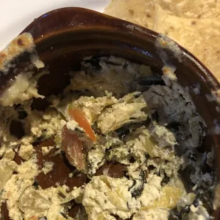 The spinach dip was a clotted spread with a strange texture.