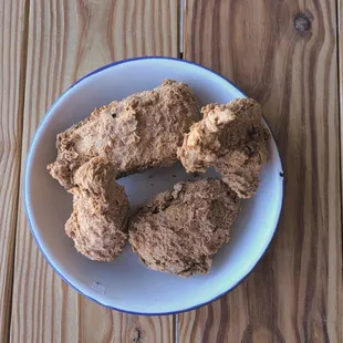 a plate of food on a wooden table