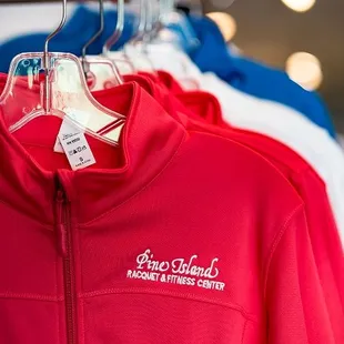 Men's and women's tennis apparel, including dry-fit shirts, collared shirts, shorts, skirts and socks are available in the Pro Shop.