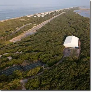 The facility is nestled among the 2,600 acres of northern Outer Banks marsh, sound and maritime forest in Audubon's Pine Island Sanctuary