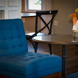 a blue chair and table