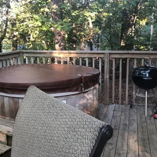 Hot tub. Easy to change temp was warm and ready when we arrived. Great grill; don't forget your charcoal.