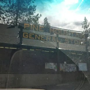 the sign for pine mountain general store