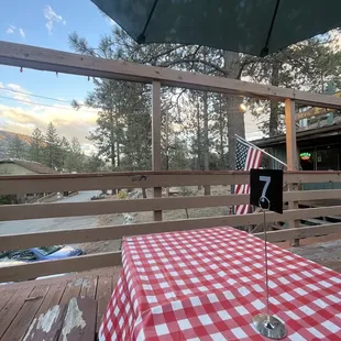 a table with a red and white checkered tablecloth