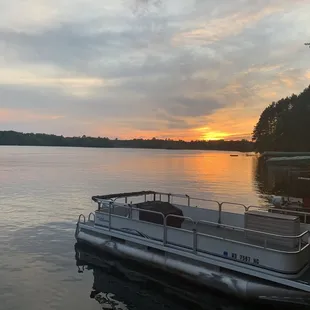 a pontoon at sunset