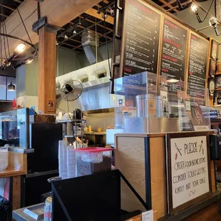 Inside near the counter where you order. 9/22/2022