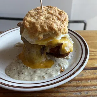 a biscuit sandwich with cheese and bacon