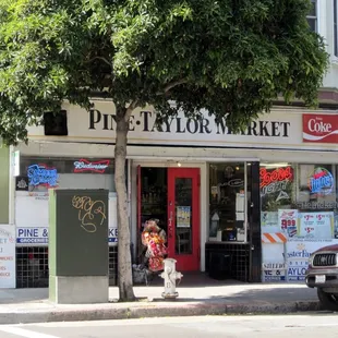 a tree in front of a store