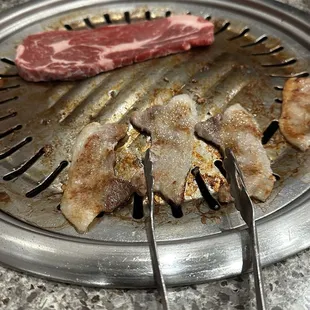 Brisket slices and black angus choice ribeye.