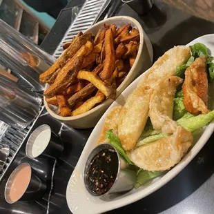 Cajun fries and vegetable pot stickers