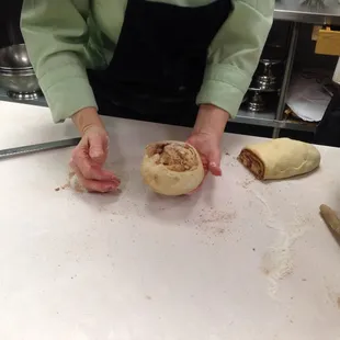Missy making her famous cinnamon rolls.