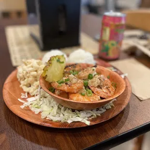 a plate of shrimp and rice