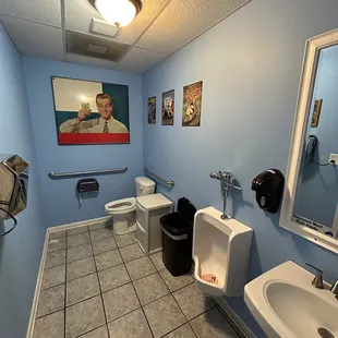 a bathroom with a toilet and sink