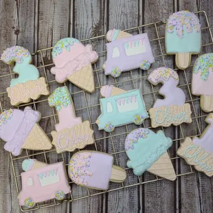 a cooling rack of decorated cookies