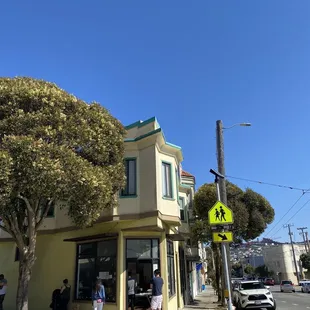 people standing on the sidewalk