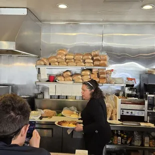 The counter area were the end of the kitchen is and the ladies pick up their food