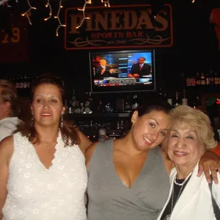 three women posing for a picture