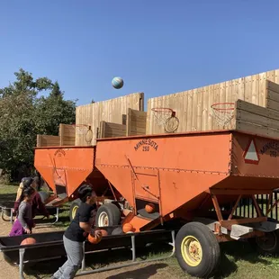 Kids shooting basketball.