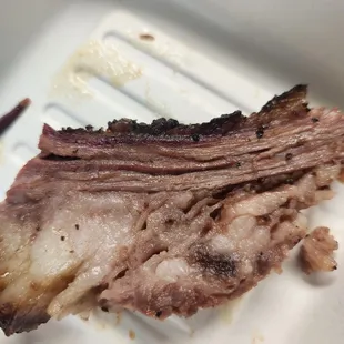 A thin strip of meat on a slice of fat does not equal brisket in my book...