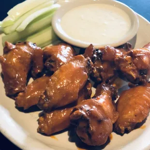 Hot wings with ranch dressing.