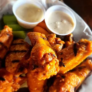 Traditional house wings, sweet &amp; spicy and grilled finish.