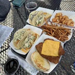 Fish tacos, pork schnitzle Sandwich and sides