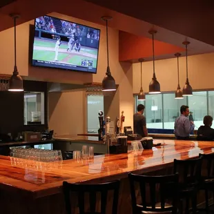 The new bar provides a warm place to enjoy a nice glass of wine or beer without missing the on ice action.