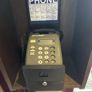 Fun old phone in the lobby