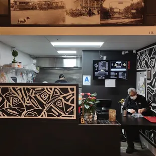 View of the service counter and kitchen preparation area