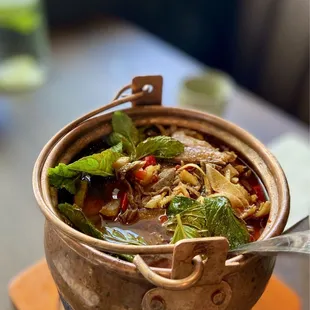 Stew beef in copper pot
