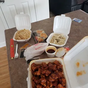 General Tso's Chicken. Volcano roll. Fried rice. Steamed dumplings.