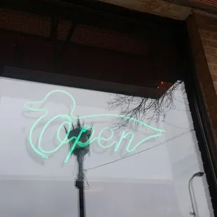 Cool open sign. Duck on menu.